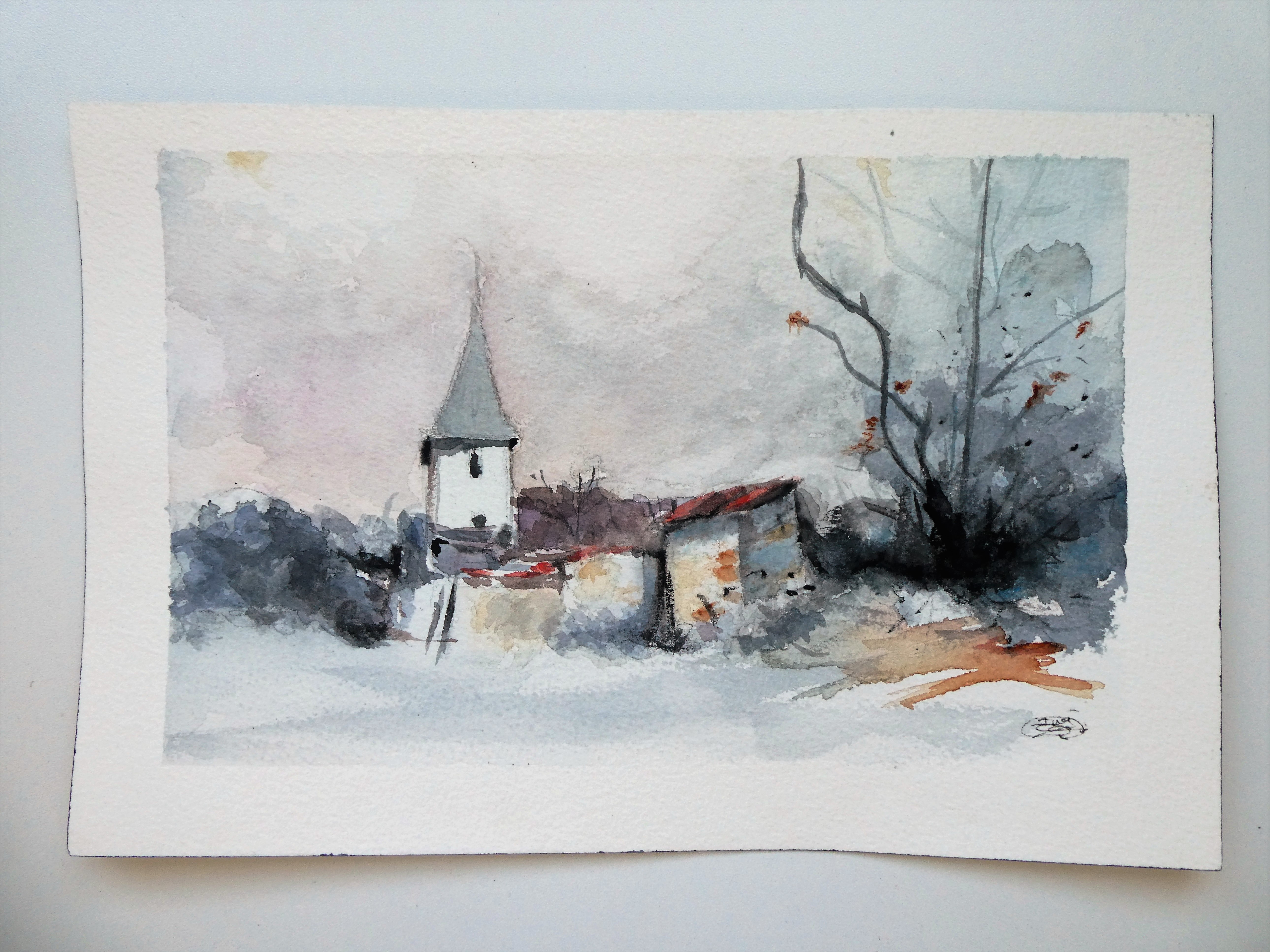 Snowy village landscape in watercolor