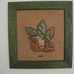 Ceramic painting, face framed fabric
