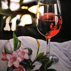 Glass of red wine and flowers