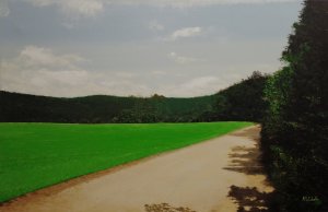 Newborn wheat on the summer road
