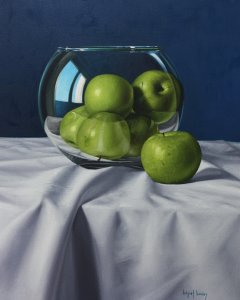 Green apples on blue background