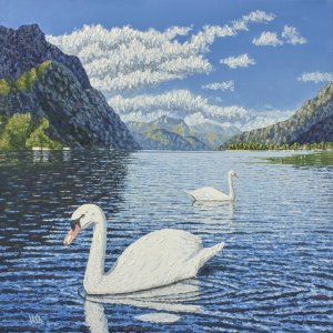 Two Swans on Italian lake Como, Alps on a background