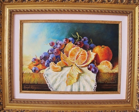 Still life with grapes and tangerines.